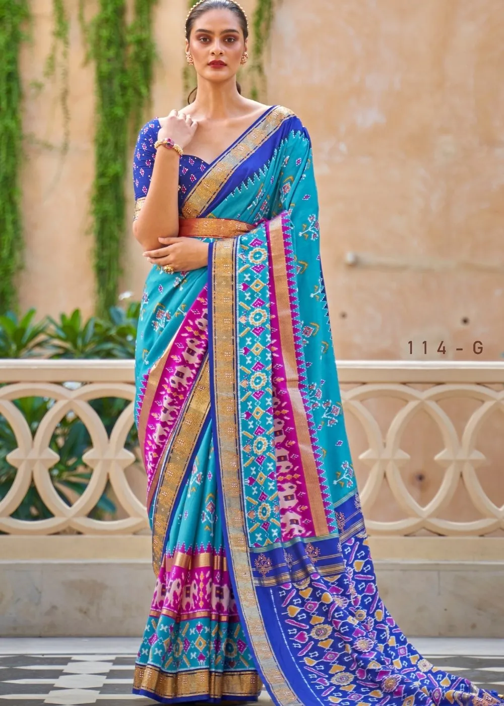 Cerulean Blue Patola Silk Saree with Zari Border & Tassels On Pallu