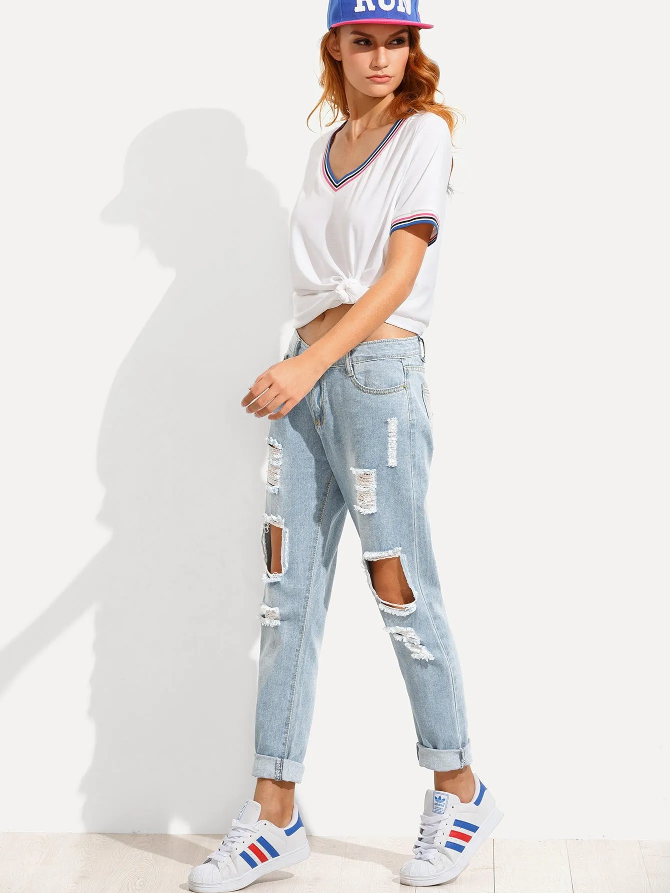 Distressed Irregular Jeans