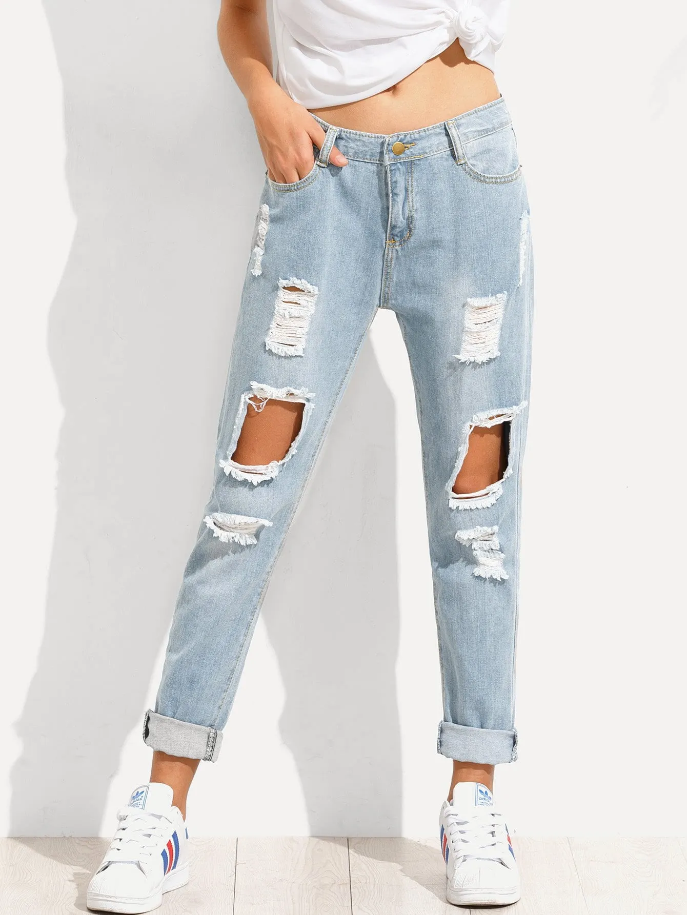 Distressed Irregular Jeans