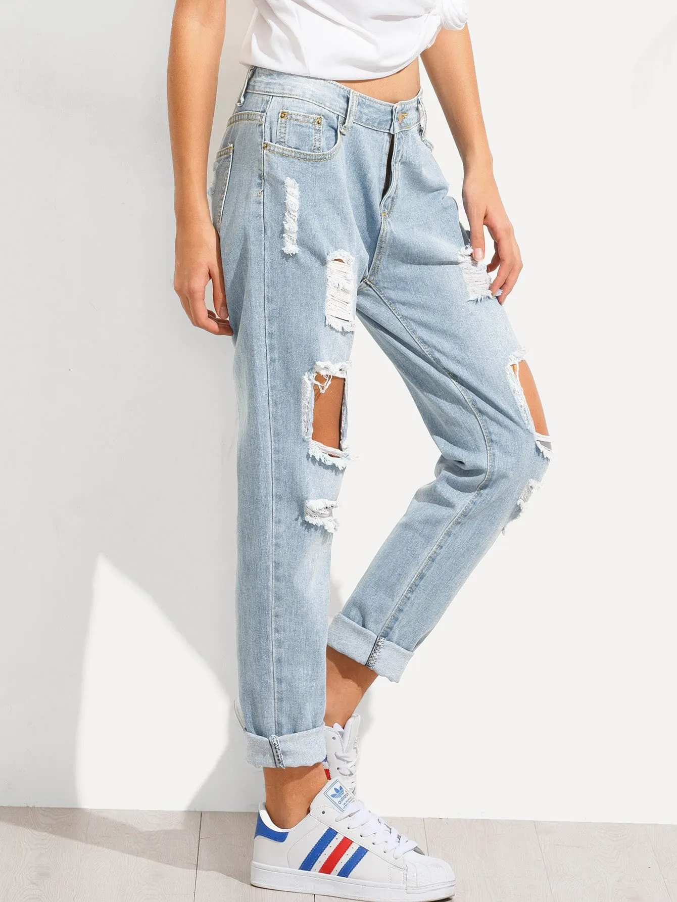 Distressed Irregular Jeans